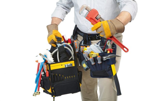 Mature contractor working. Over white background. Worker